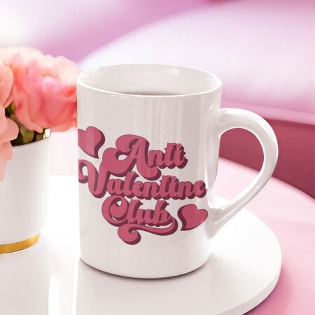 A mug with the "Anti Valentine Club" free svg file on it.