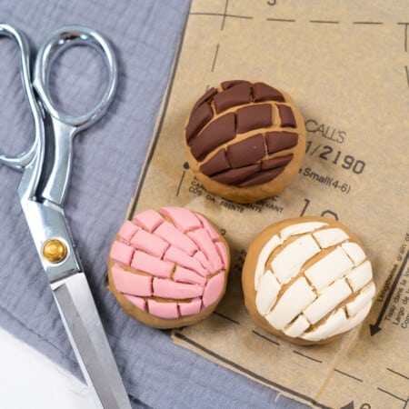 Pattern weights made with polymer clay to look like Mexican Concha sweet bread