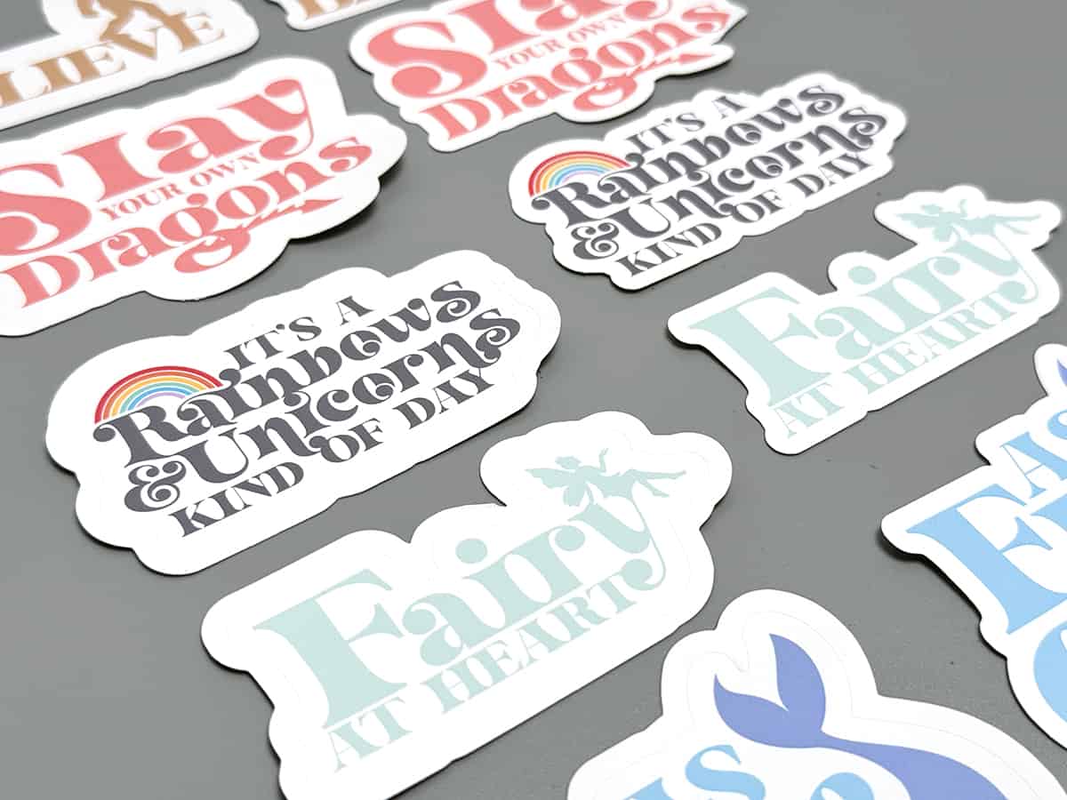 A group of stickers with different writing.