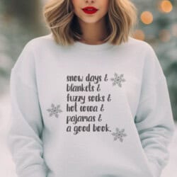Woman in a white sweater with text about cozy winter activities, standing outdoors.