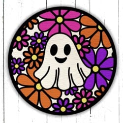 A cute ghost illustration surrounded by pink, orange, and purple flowers on a circular background.